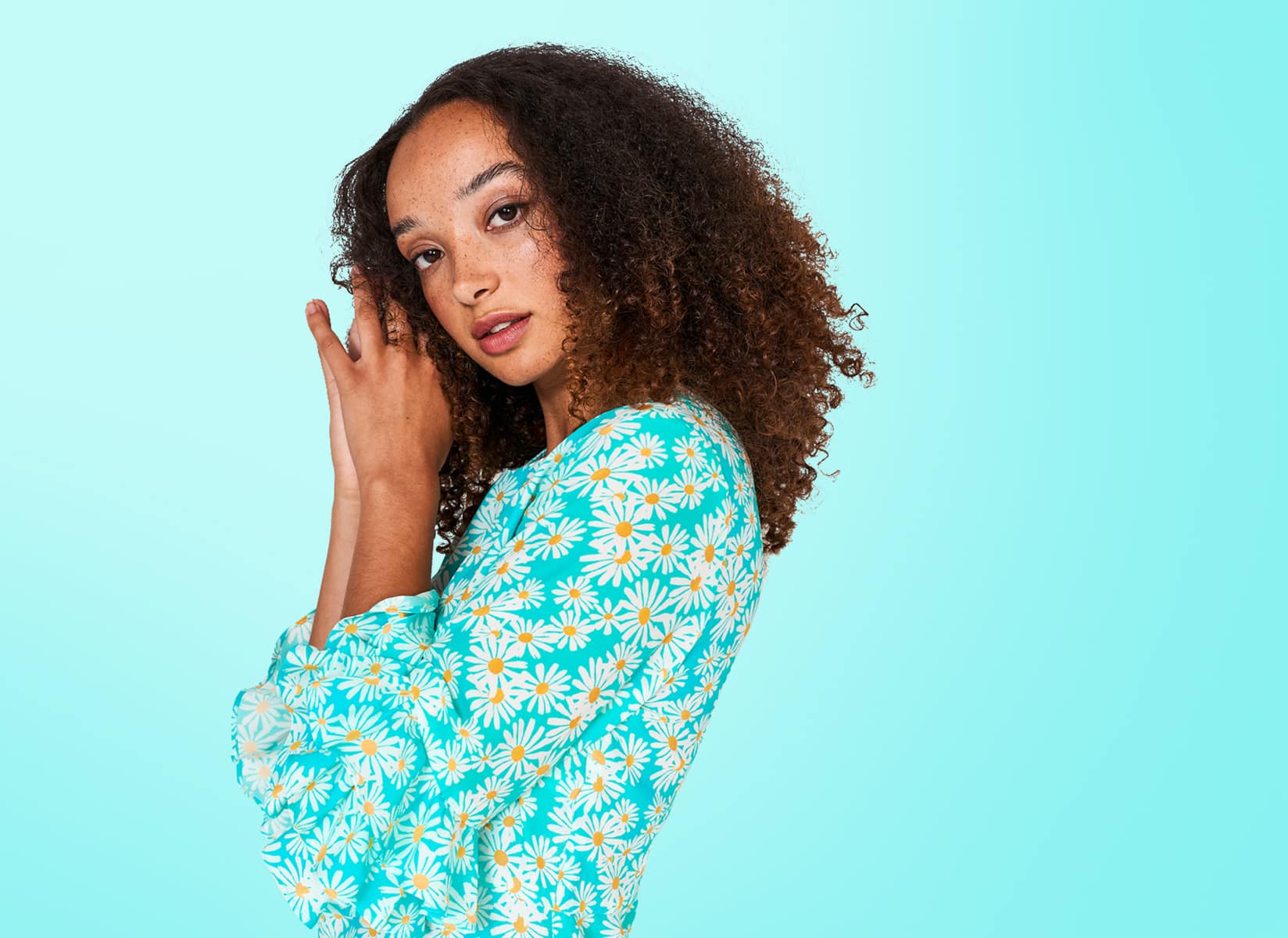 Female model in blue flowery dress